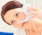 Jala neti using neti pot.jpg